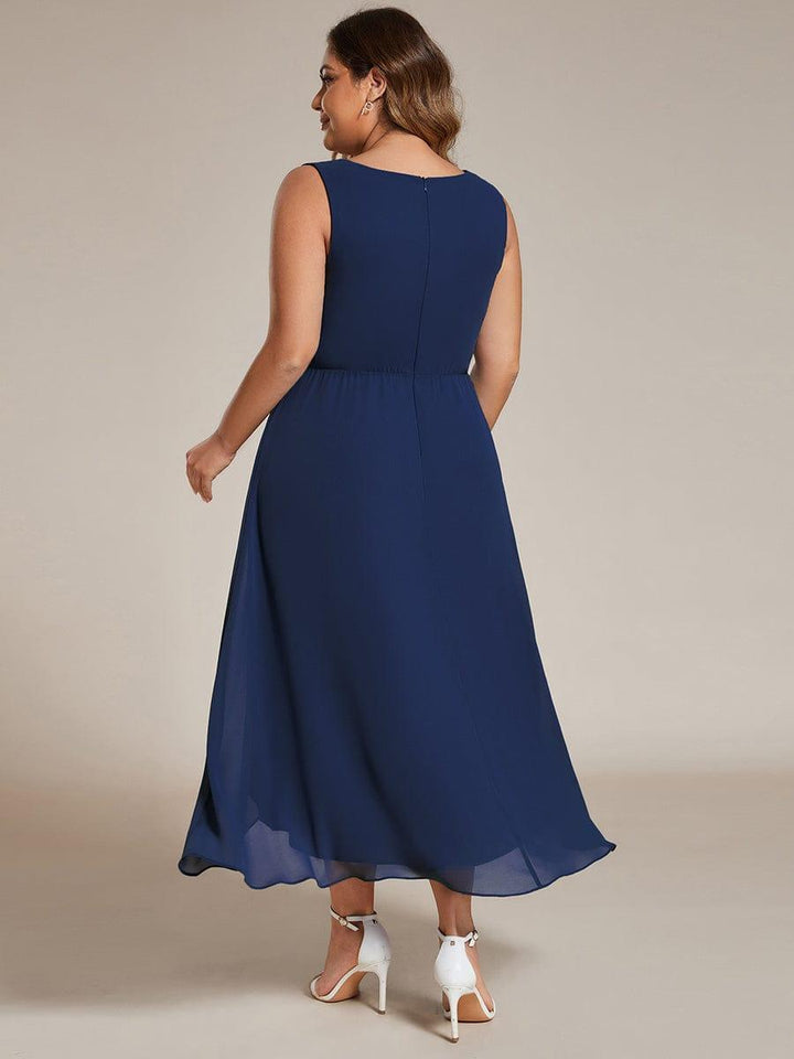 pretty IRYS|Plus Size Sleeveless Chiffon High-Low Wedding Guest Dress with Waist Applique